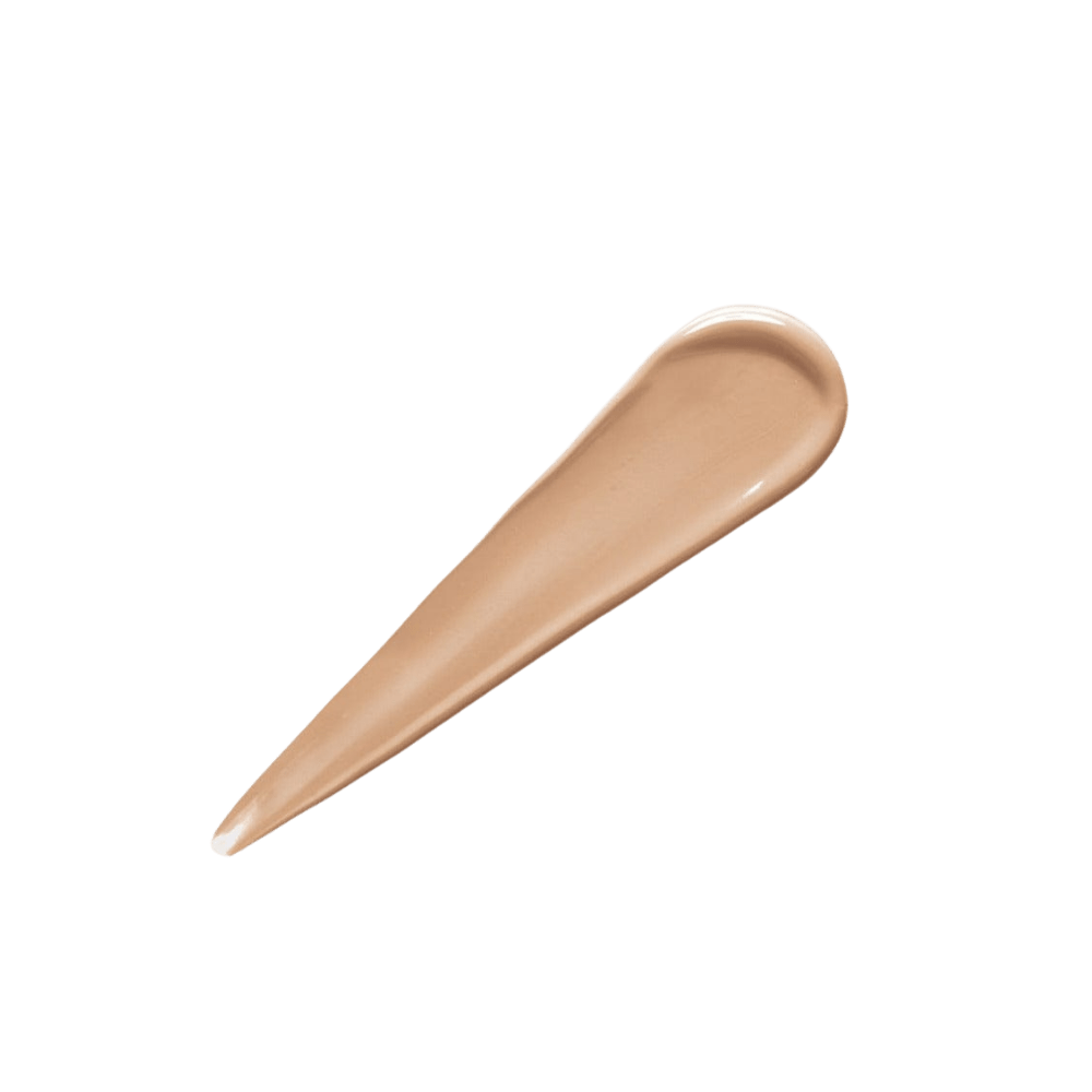 Transparent glass bottle containing a beige liquid foundation by L'Oreal.