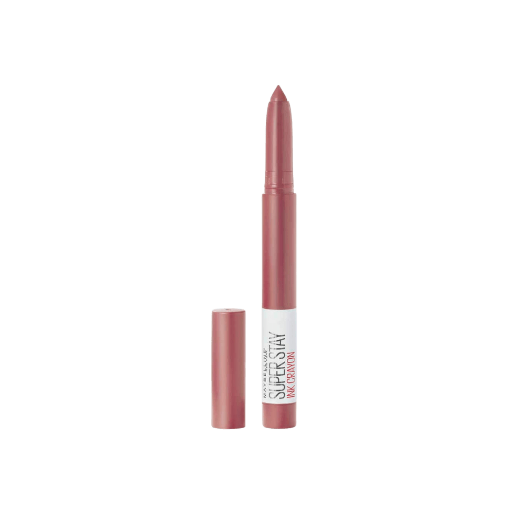 Close-up of a sleek matte lipstick crayon with a pointed tip in a soft pink shade.