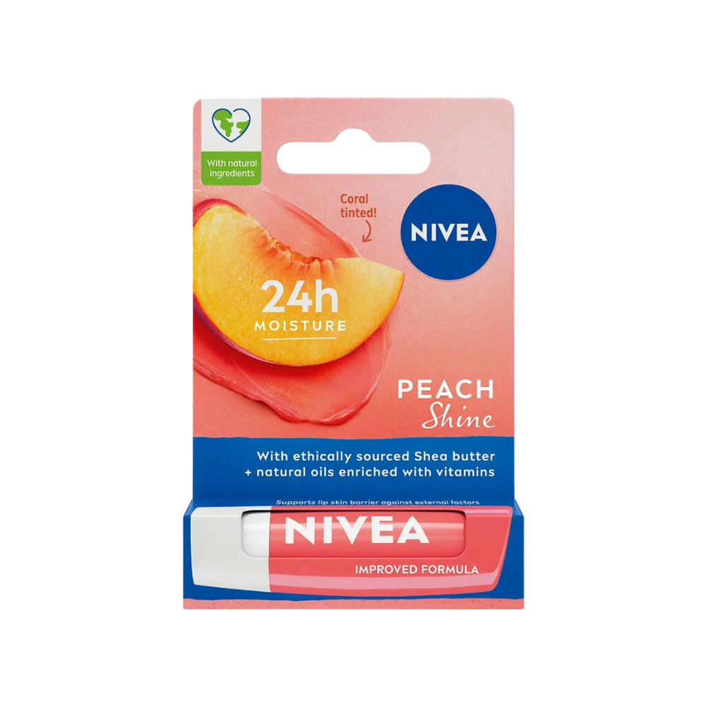 A single tube of Nivea peach lip balm standing upright with its vibrant label visible.