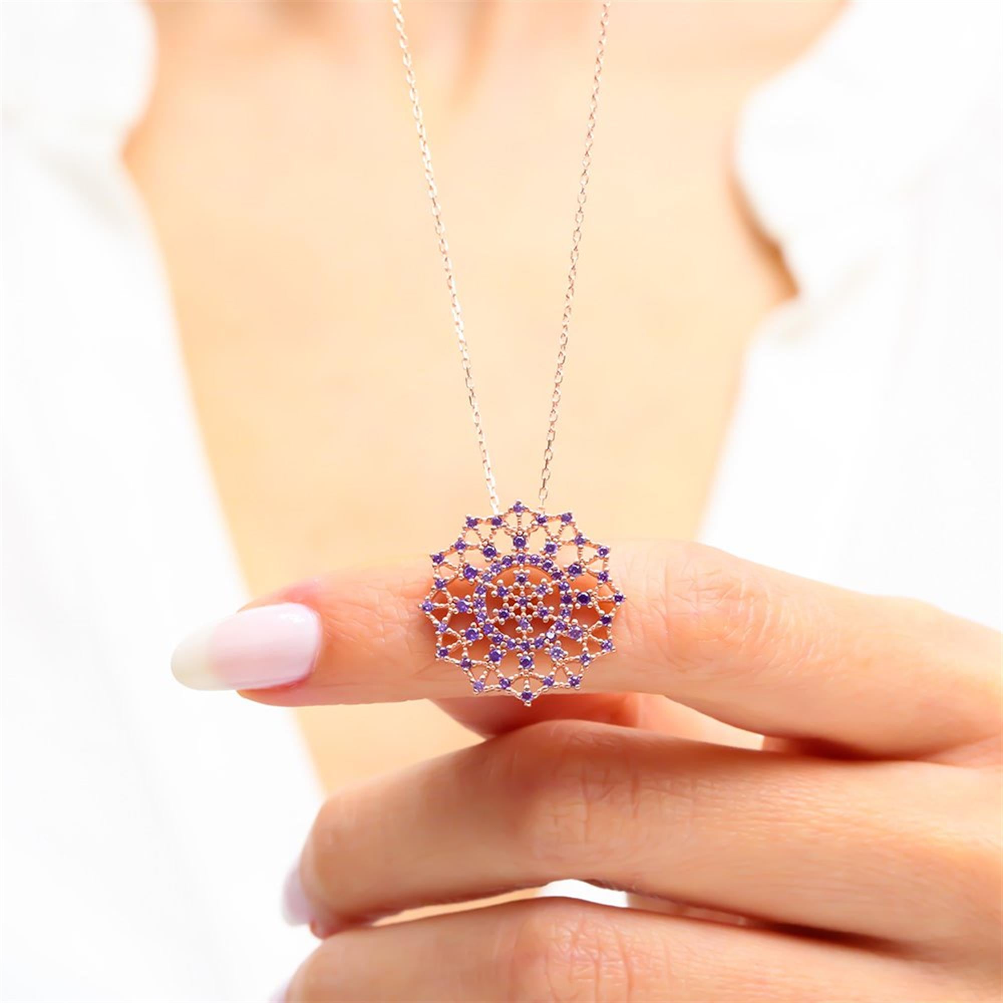 Intricate amethyst mandala necklace in rose gold featuring a symbolic royal seal star pattern – elegant and spiritual design.