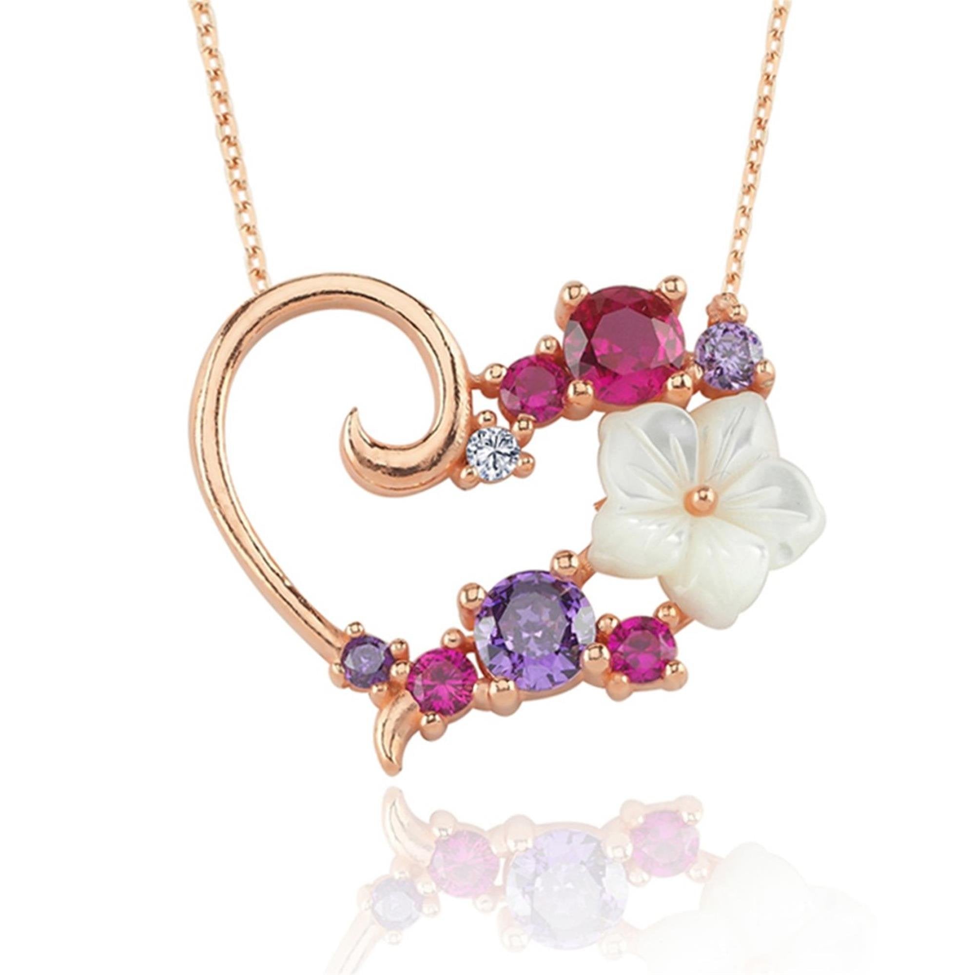 Rose gold heart necklace with white magnolia flower and multicolor zircon stones, romantic and floral jewelry design