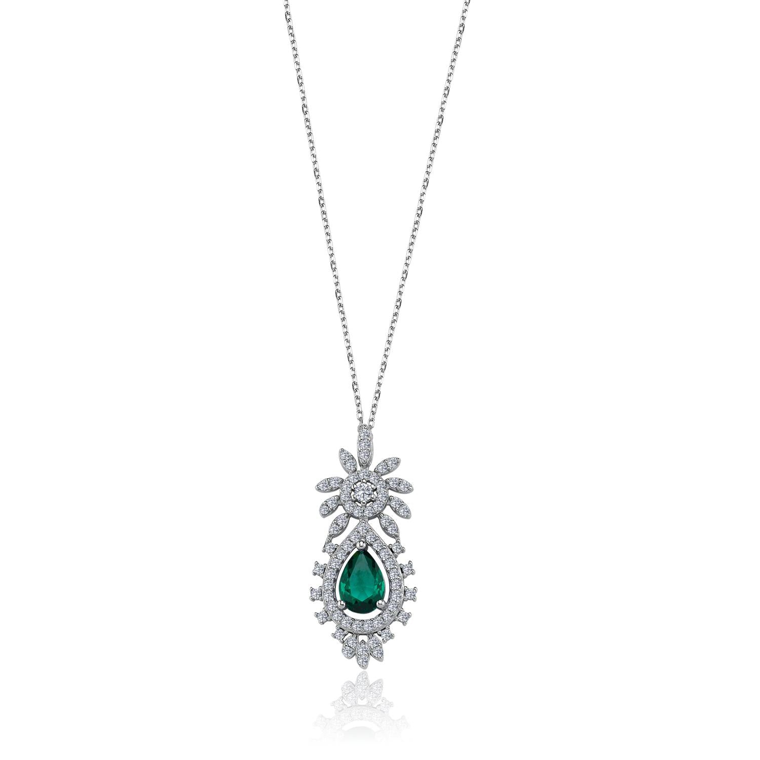 Silver necklace with green teardrop gemstone, floral zirconia design and brilliant halo