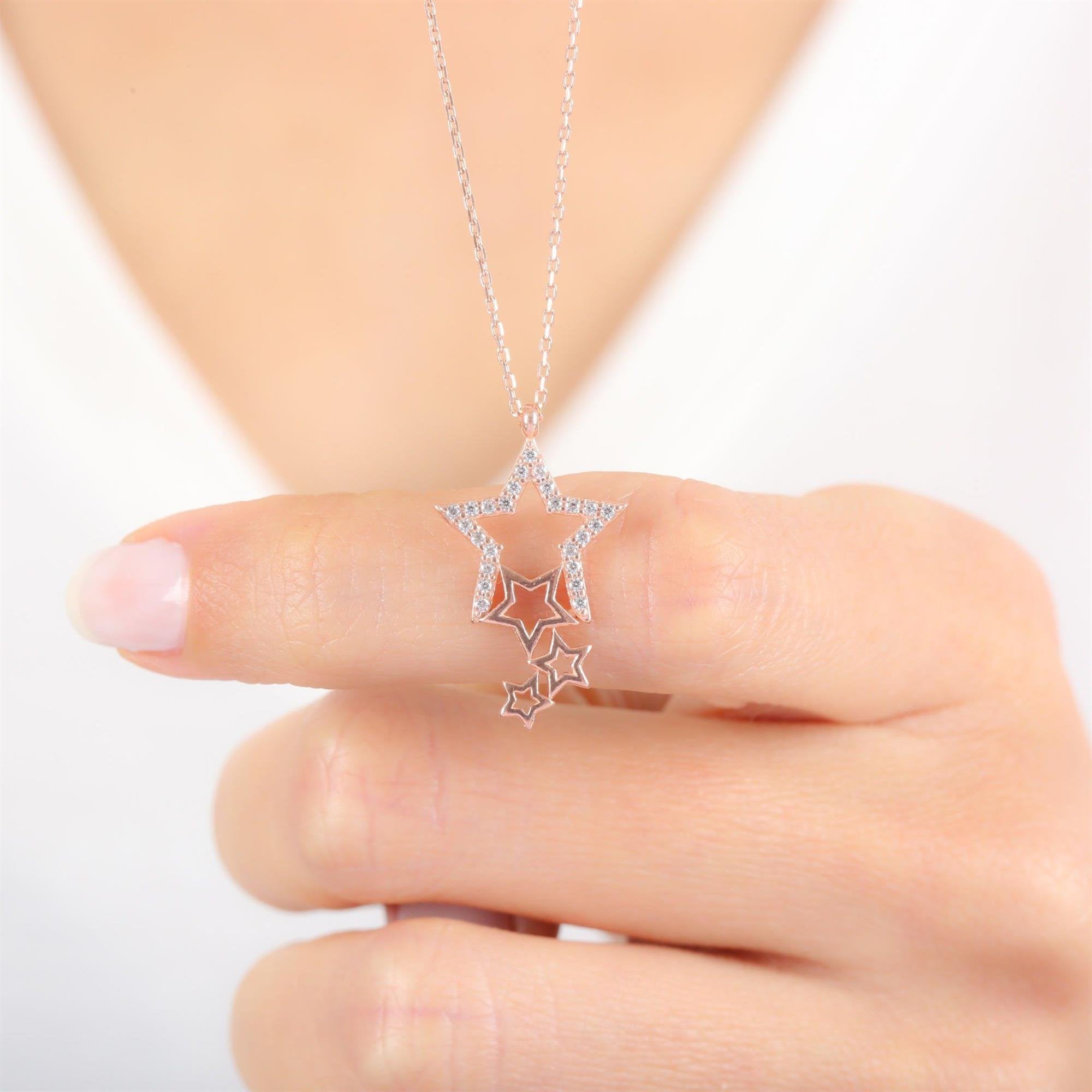 Delicate micropavé star drop necklace in sterling silver with rose gold plating - celestial gift jewelry for women