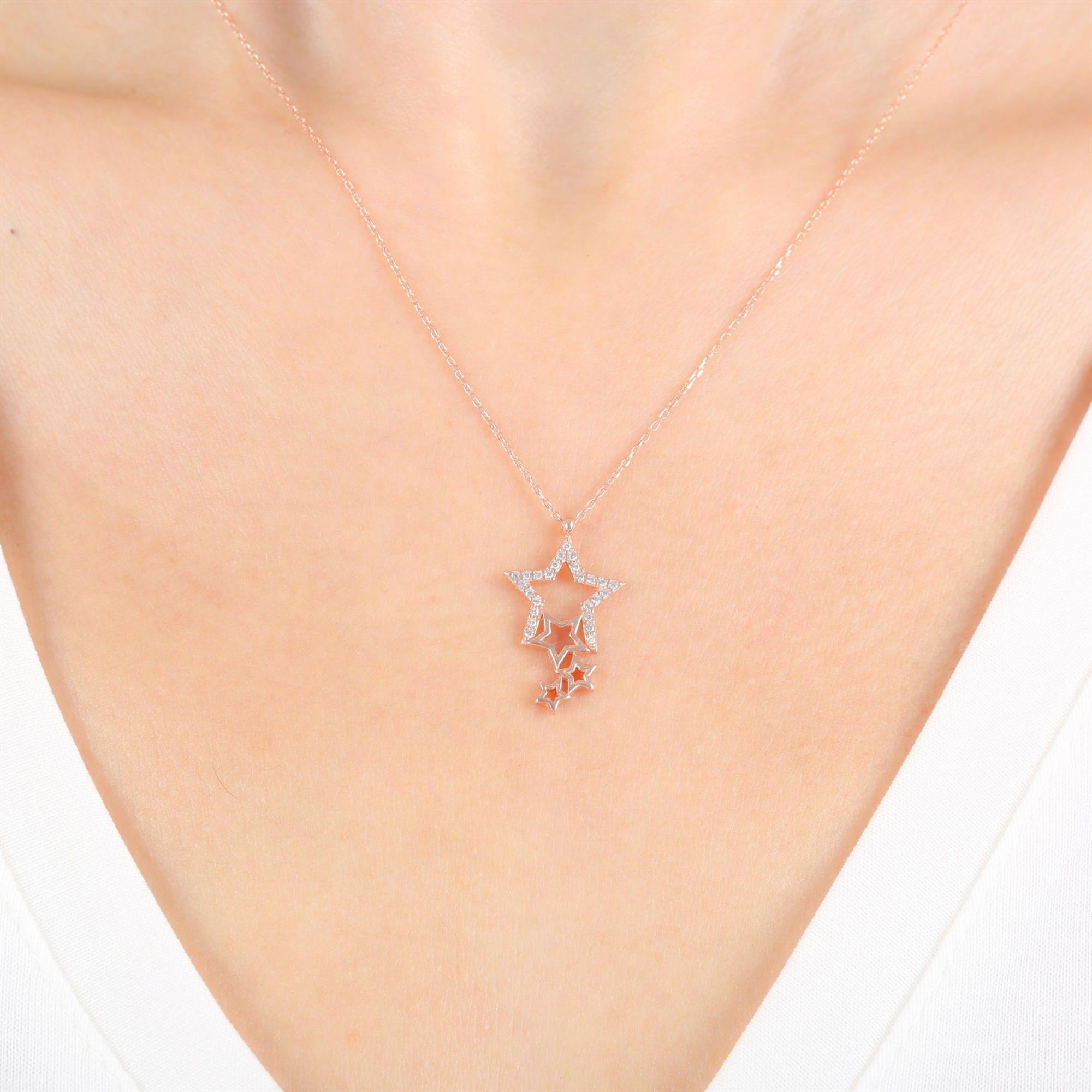 Delicate micropavé star drop necklace in sterling silver with rose gold plating - celestial gift jewelry for women