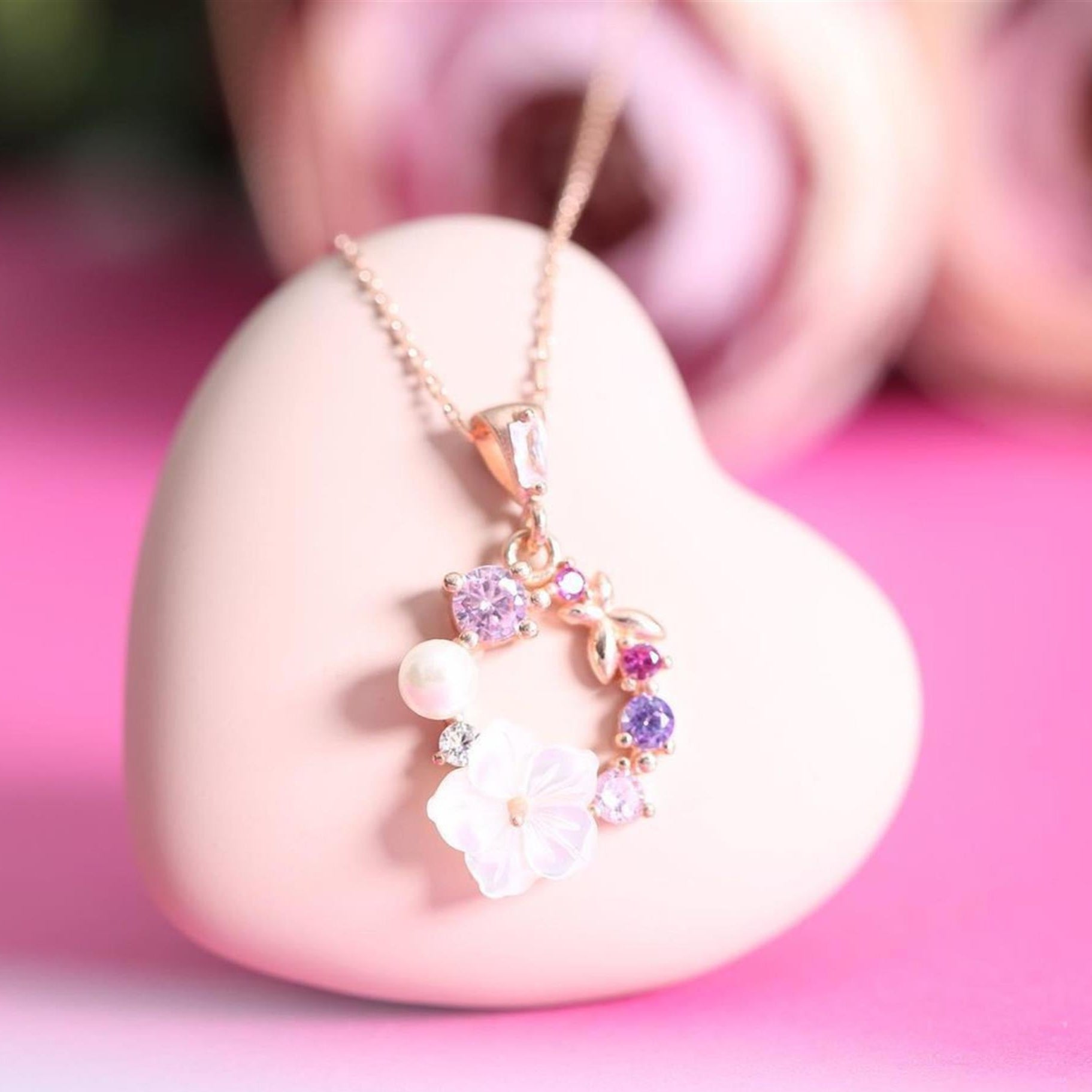 Rose gold plated Italian style necklace with pastel zircon stones and a pearl – soft floral elegance for everyday charm.