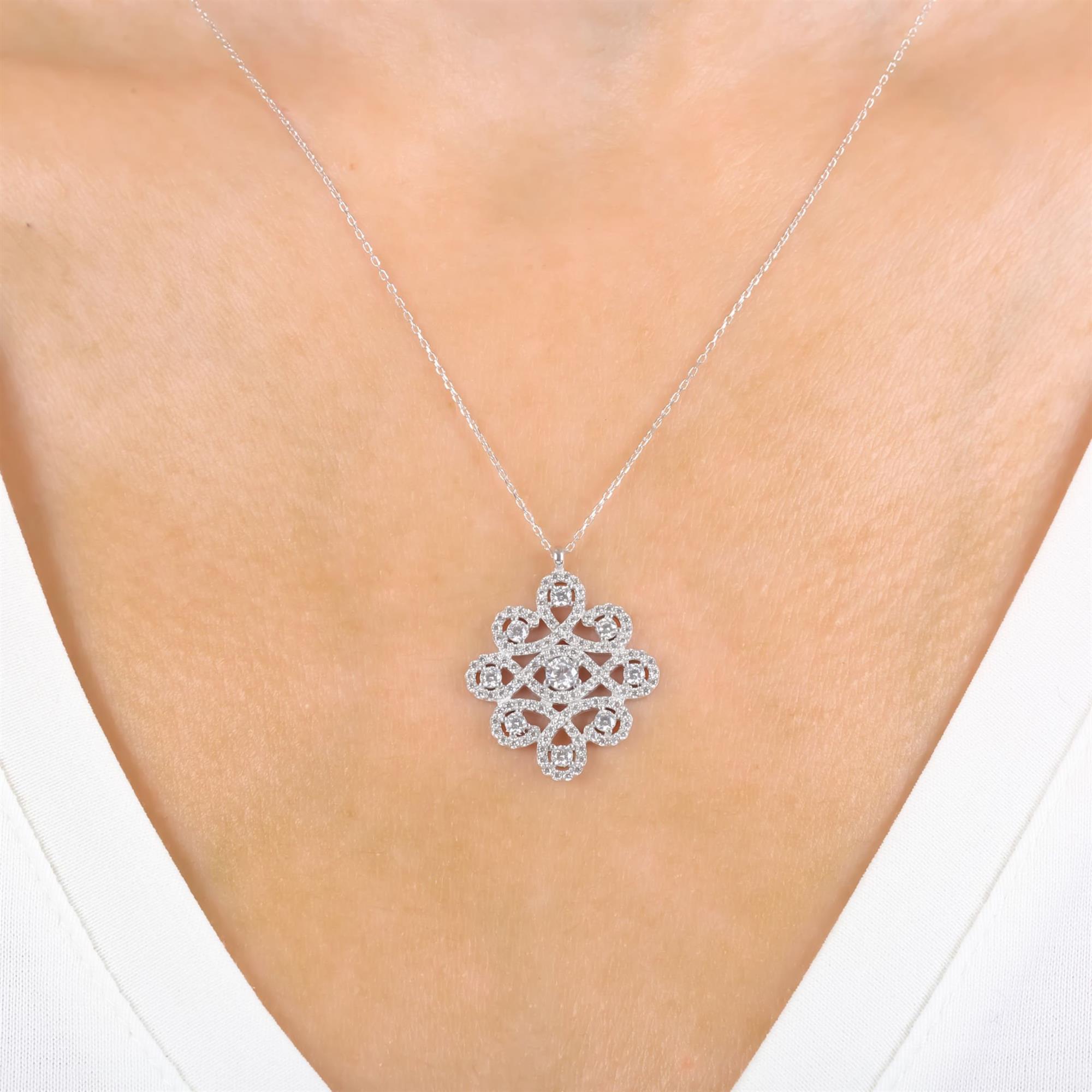 Sterling silver infinity knot necklace with CZ stones