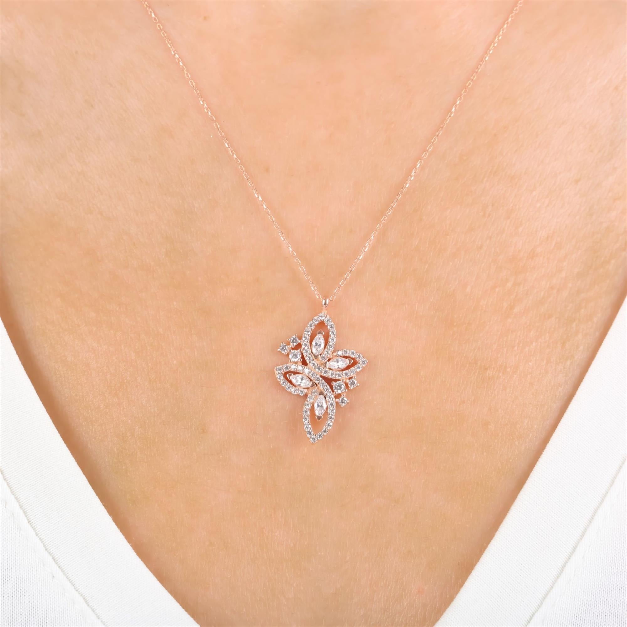 Rose gold butterfly pendant necklace with openwork marquise CZ design