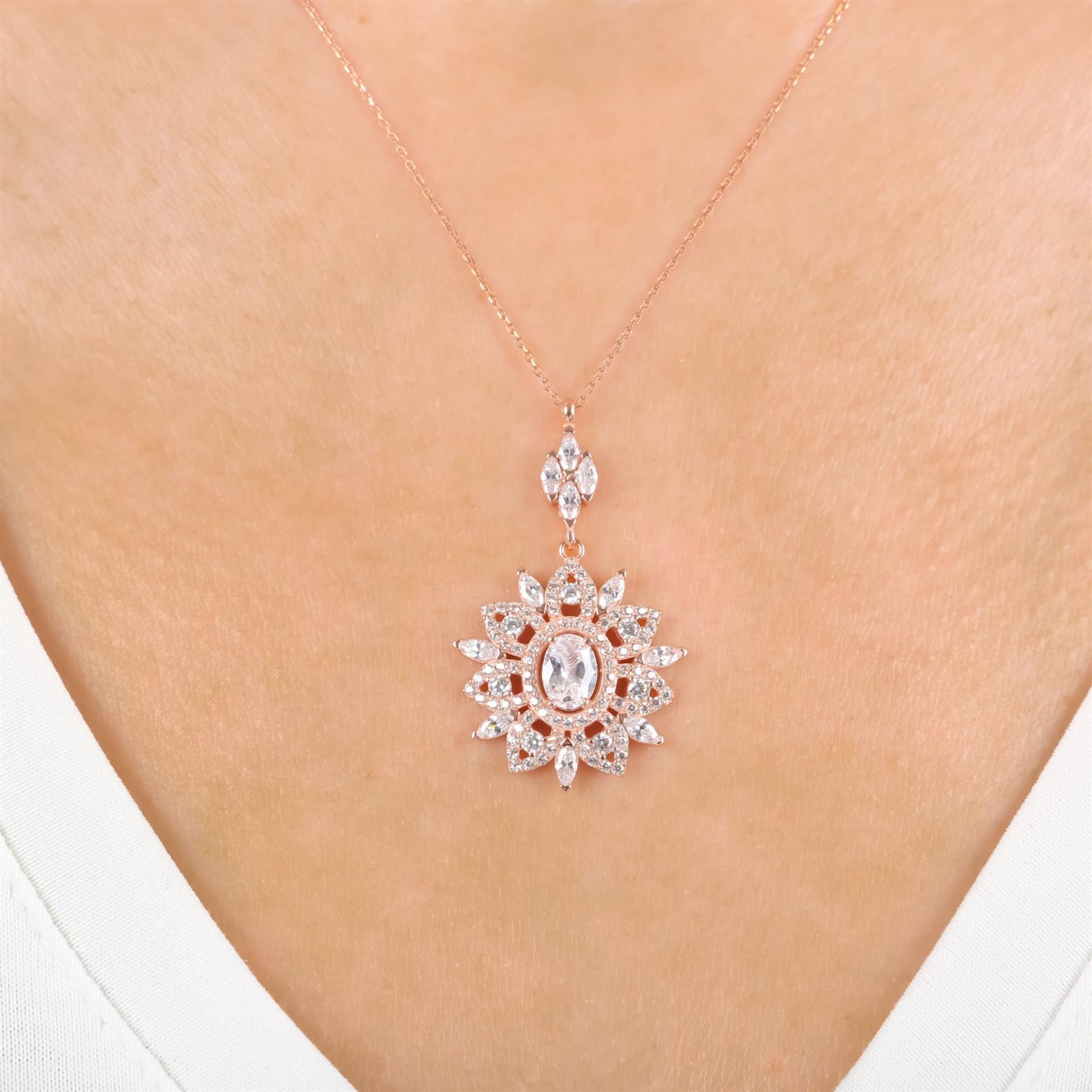 Rose gold plated sterling silver sunburst pendant necklace with oval and marquise CZ stones