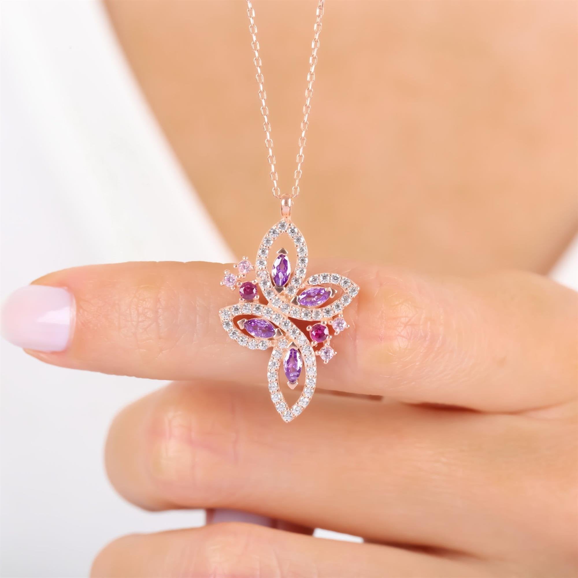 Rose gold butterfly pendant necklace with pink, purple, and clear CZ stones – whimsical fairy-inspired jewelry for women