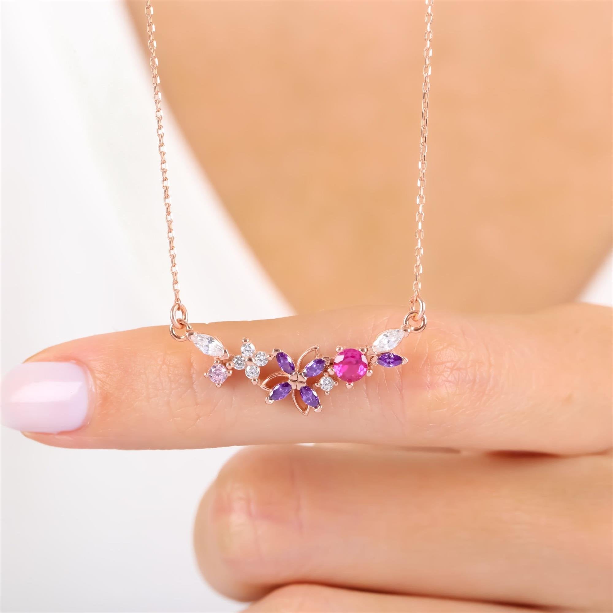 Rose gold butterfly and flower necklace with pink, purple, and clear CZ stones – whimsical spring-inspired jewelry for women