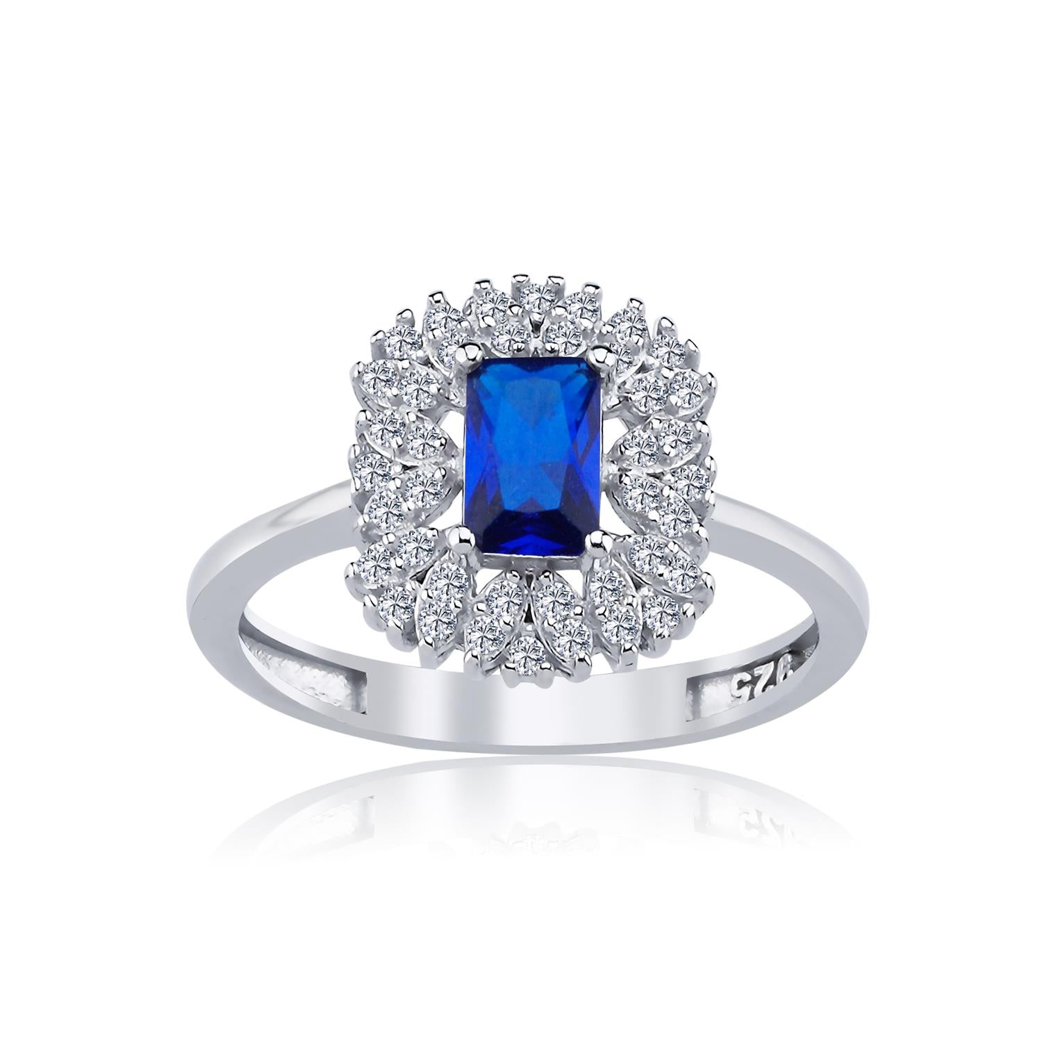 Silver ring with baguette-cut blue sapphire and sparkling zircon halo