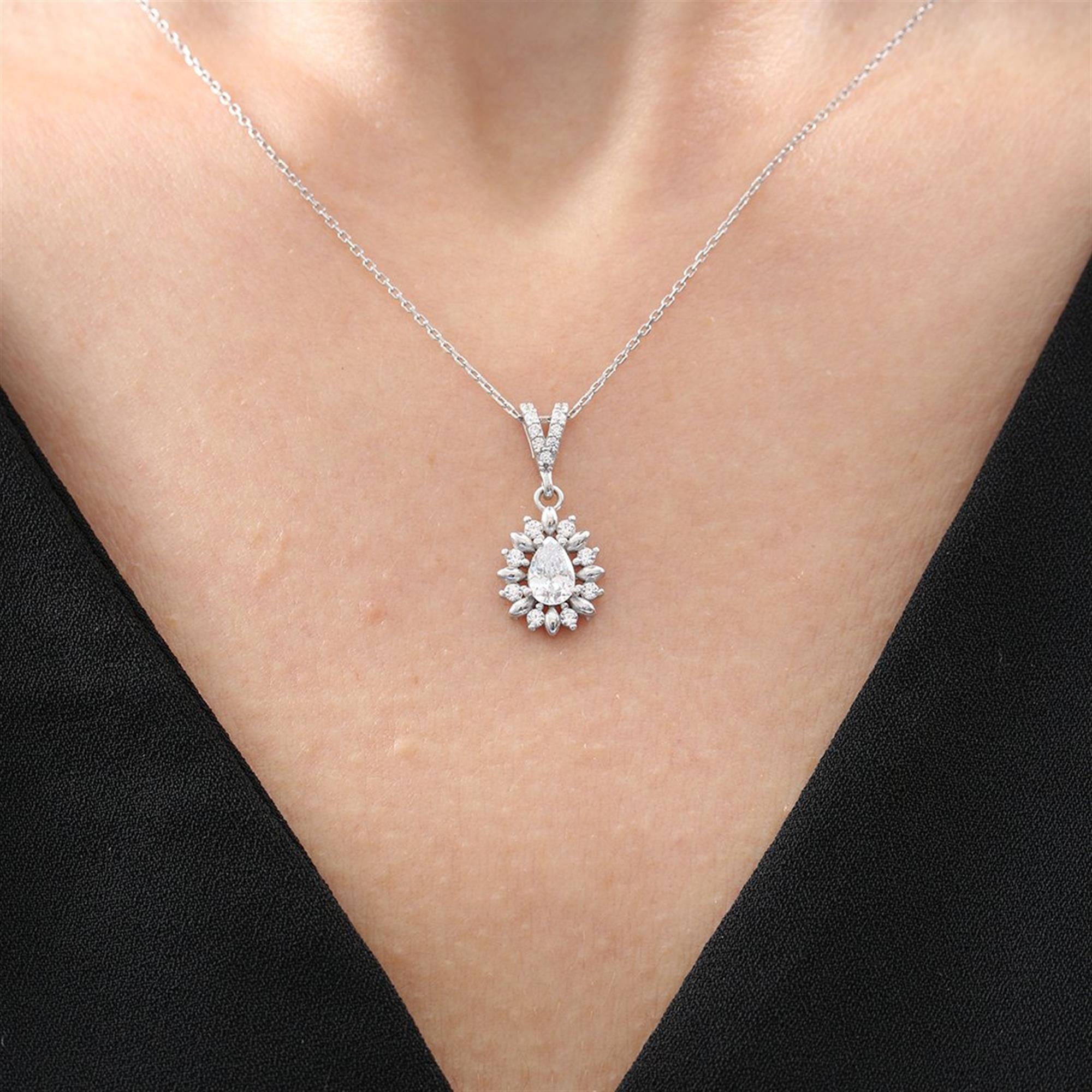 Silver teardrop necklace with marquise-cut halo zirconia and V-shaped stone bail