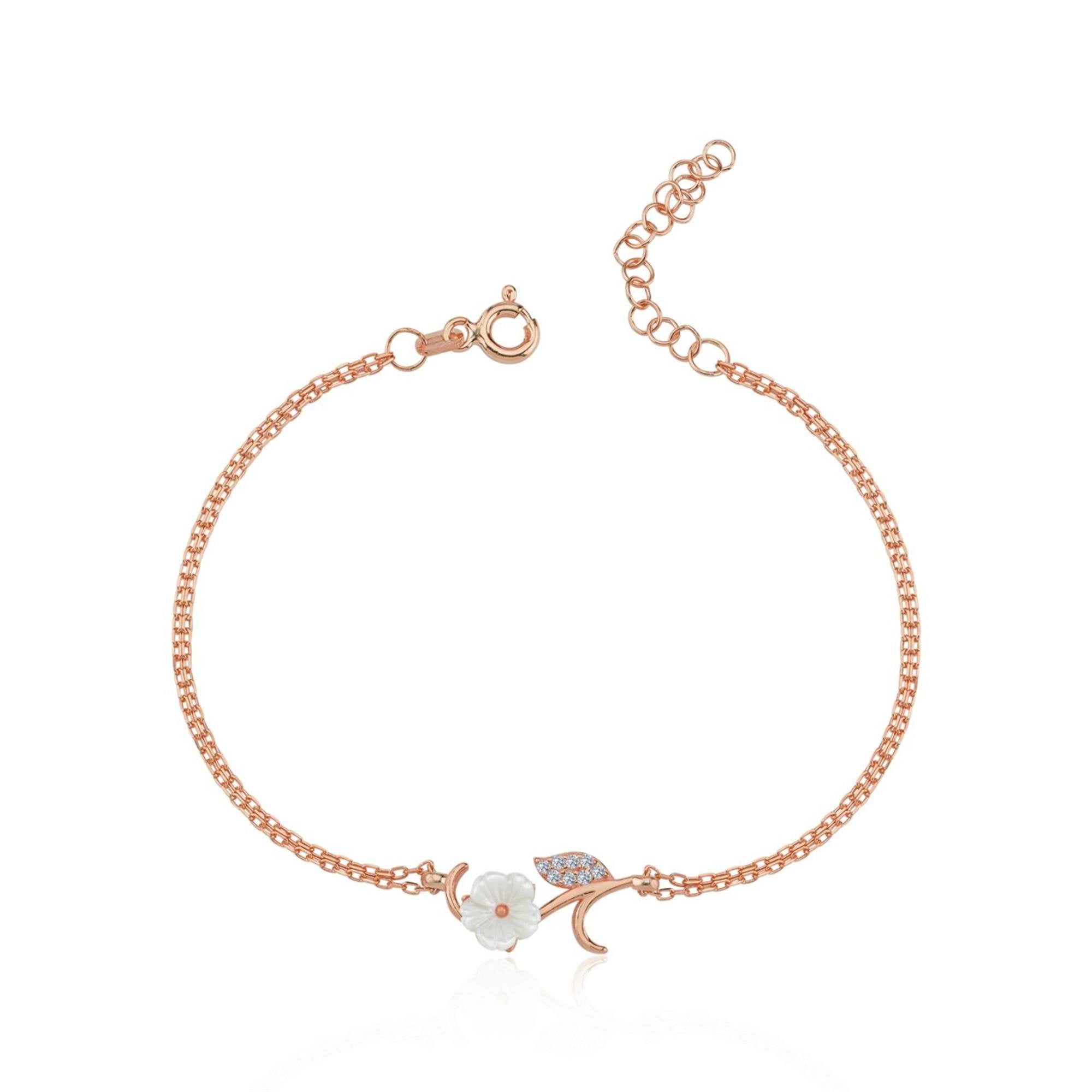 Pulsera rosa con flor blanca de magnolia y hoja brillante en cadena doble