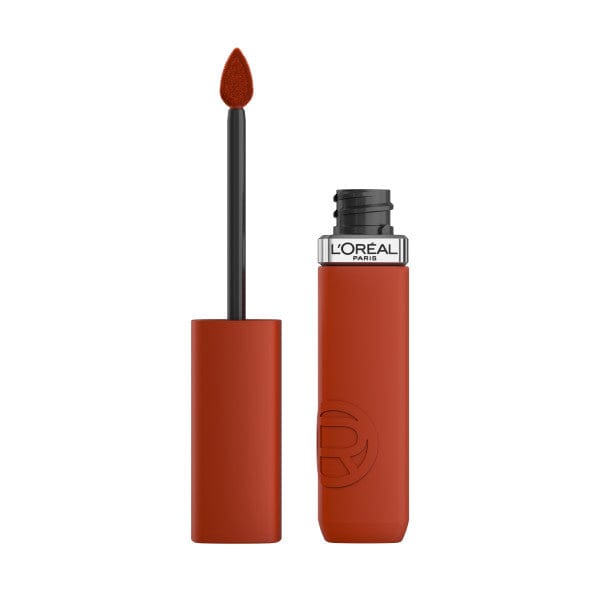 Close-up of L'Oreal Paris liquid lipstick in a sleek, matte black and transparent tube, shade 300 Sun Bathing.