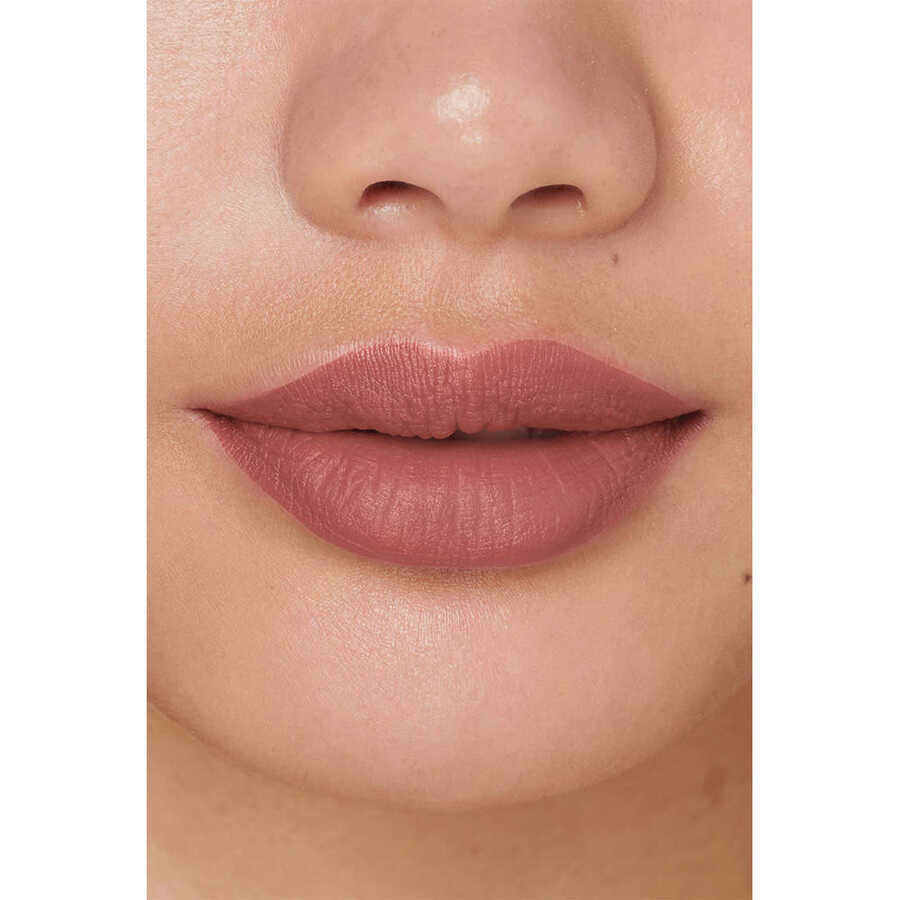 Matte finish lipstick crayon in a neutral beige shade, showcasing its smooth, pointed applicator.