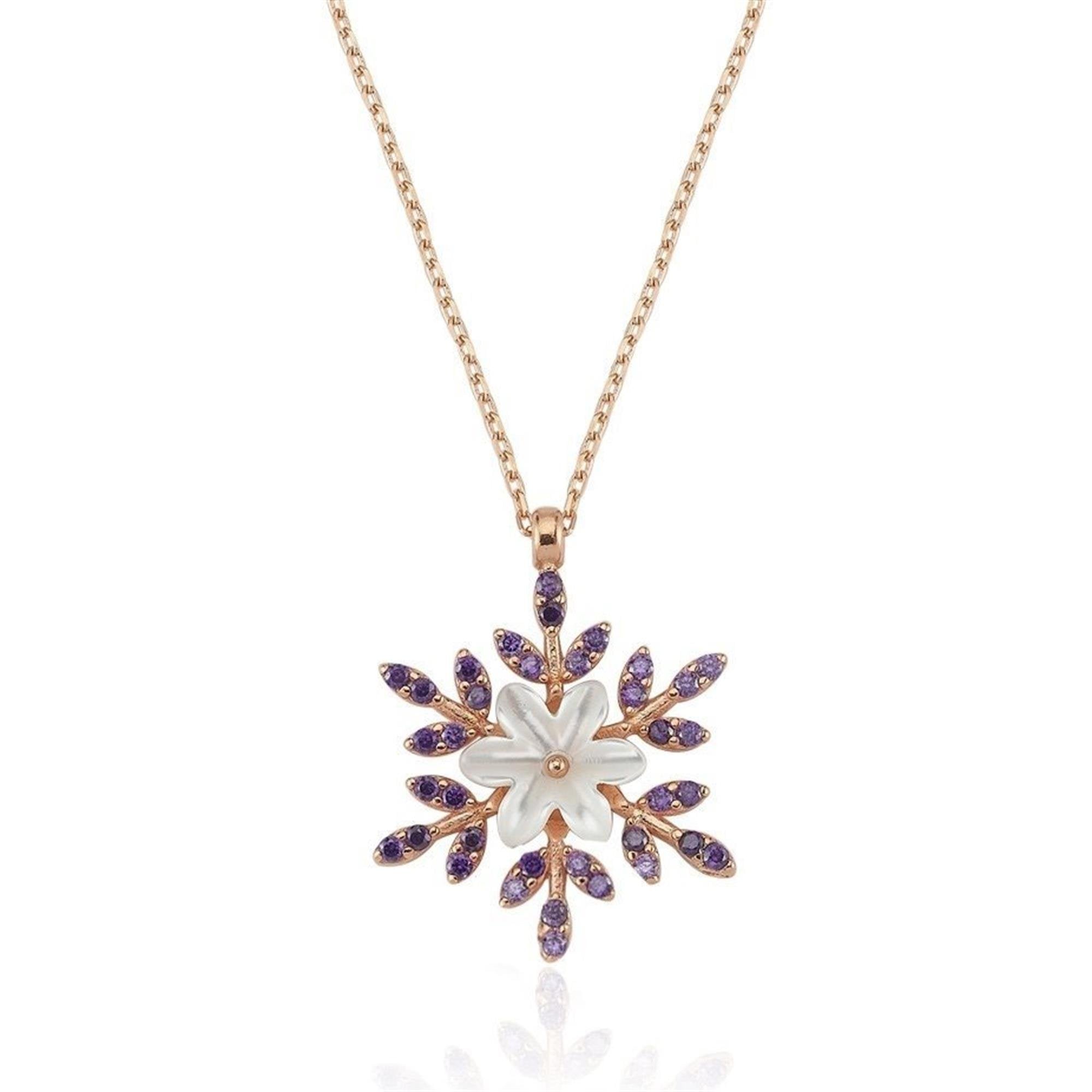 Collar rosa con flor blanca en el centro y diseño de copo de nieve con piedras amatista