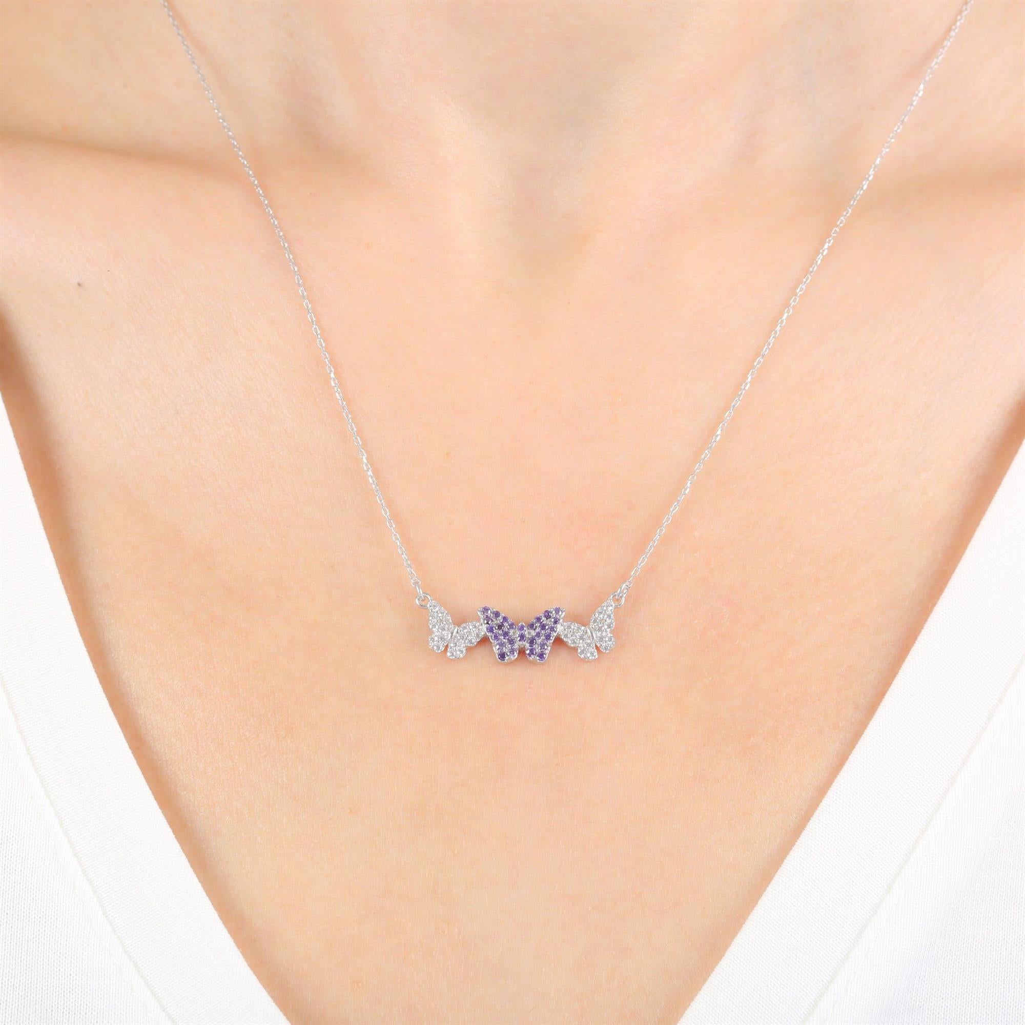 Sterling silver necklace with trio butterfly design featuring purple amethyst and cubic zirconia stones – elegant jewelry for women