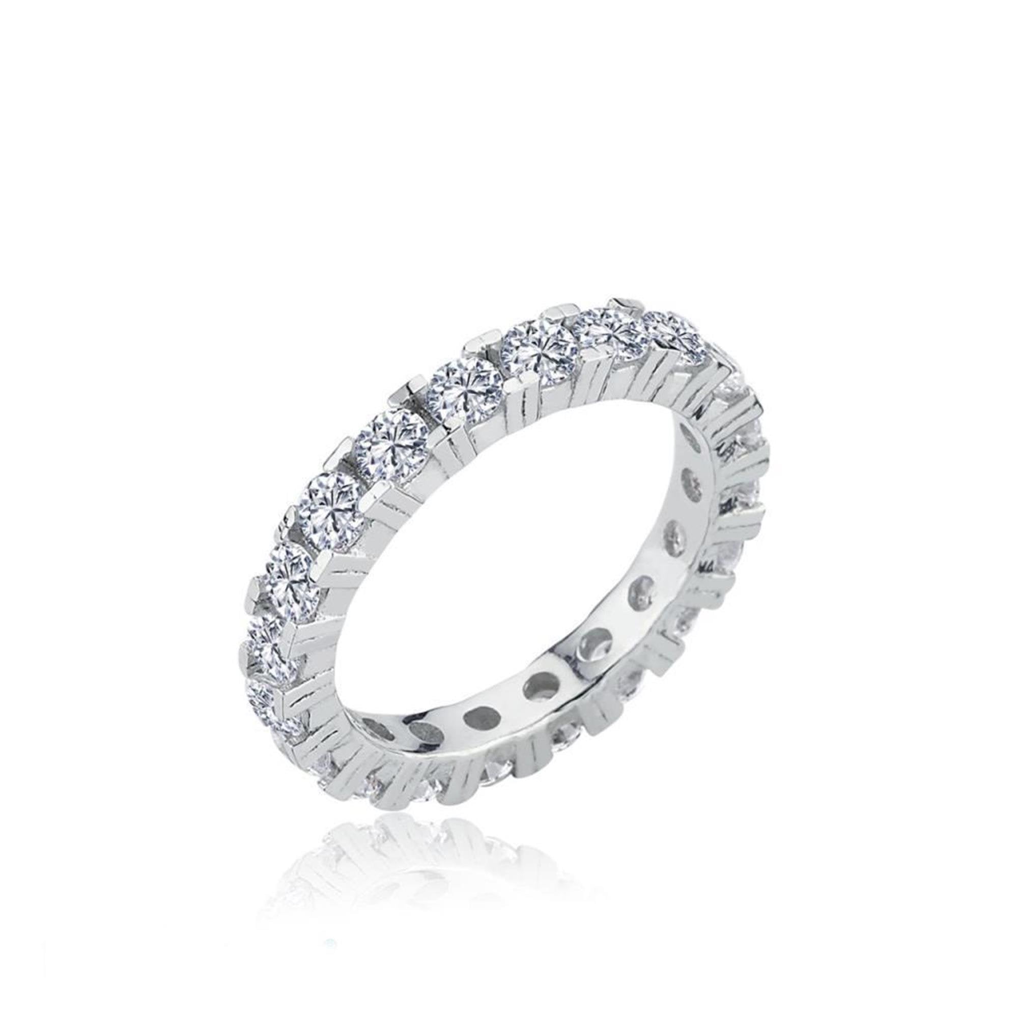 Rhodium-plated silver eternity ring with full circle of zircon stones, perfect for stacking or wearing solo for an elegant touch.