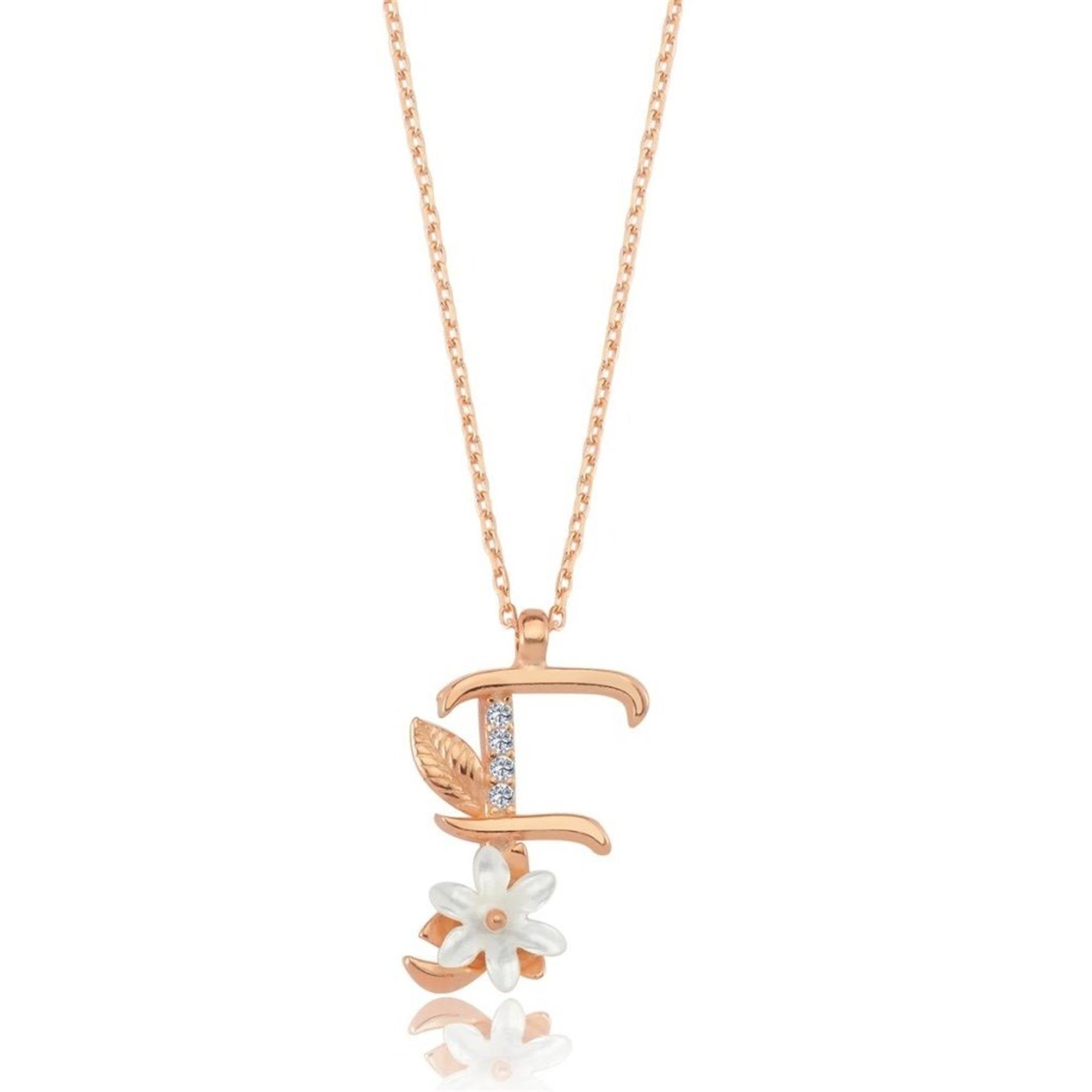 Collar con letra F en oro rosa con flor de magnolia y circonitas brillantes – un regalo floral y personalizado para ella.