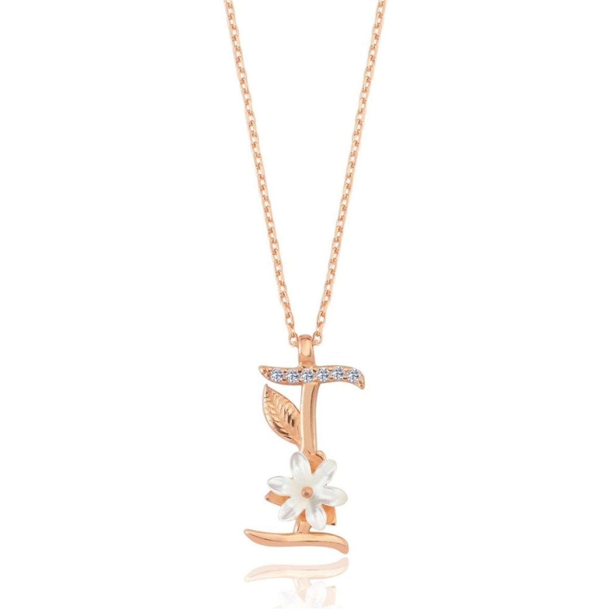Roségoldene I-Buchstaben-Halskette mit Magnolienblume und funkelnden Zirkonia – ein persönliches und blumiges Geschenk für sie.
