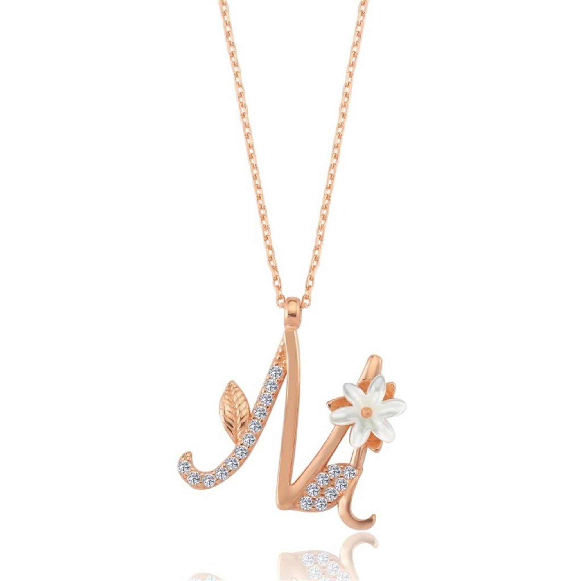 Personalized M initial necklace with magnolia flower and zircon stones – elegant rose gold pendant for everyday and gifting.