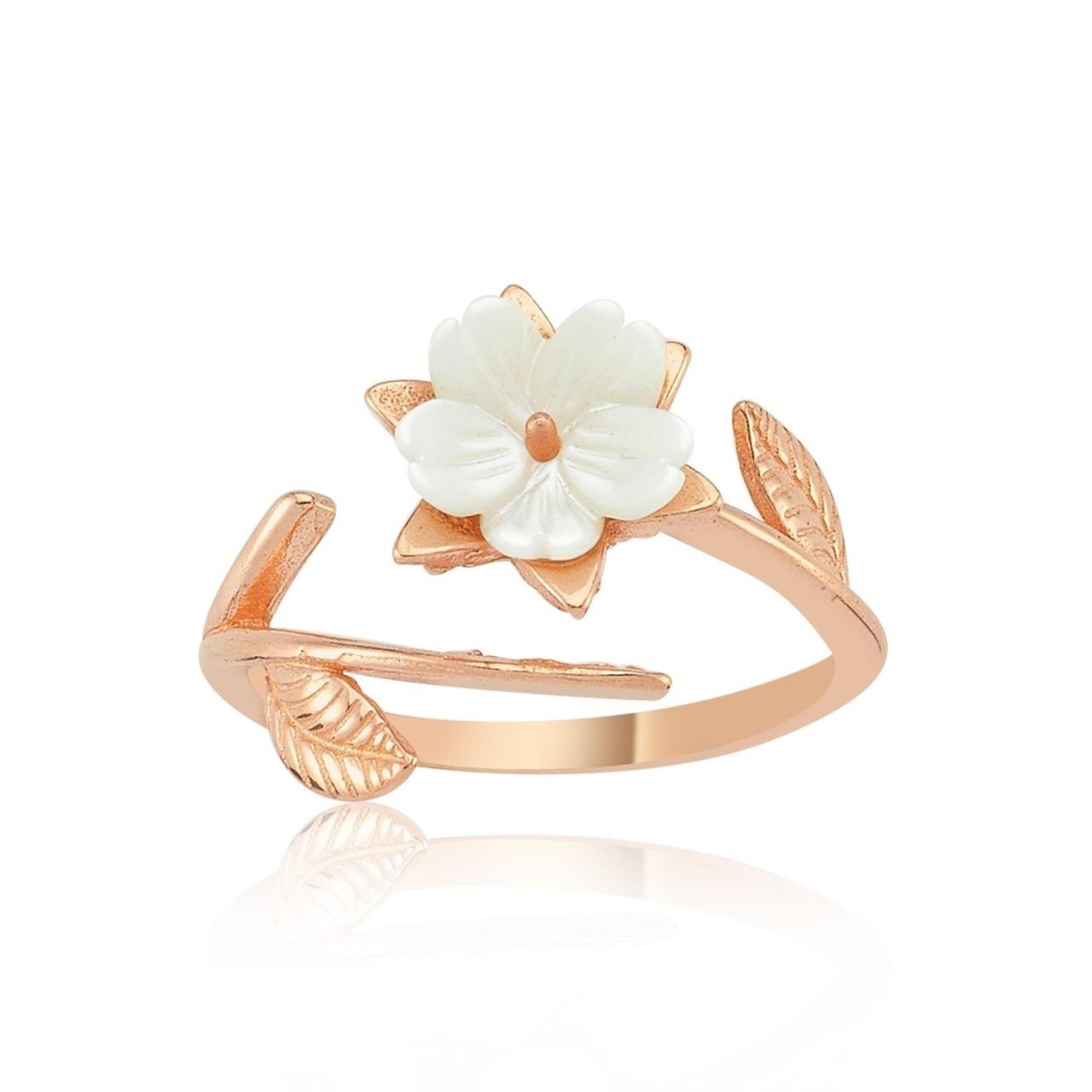 A rose gold-plated silver ring featuring a detailed magnolia flower and vine design, perfect as a spring or nature-inspired accessory.