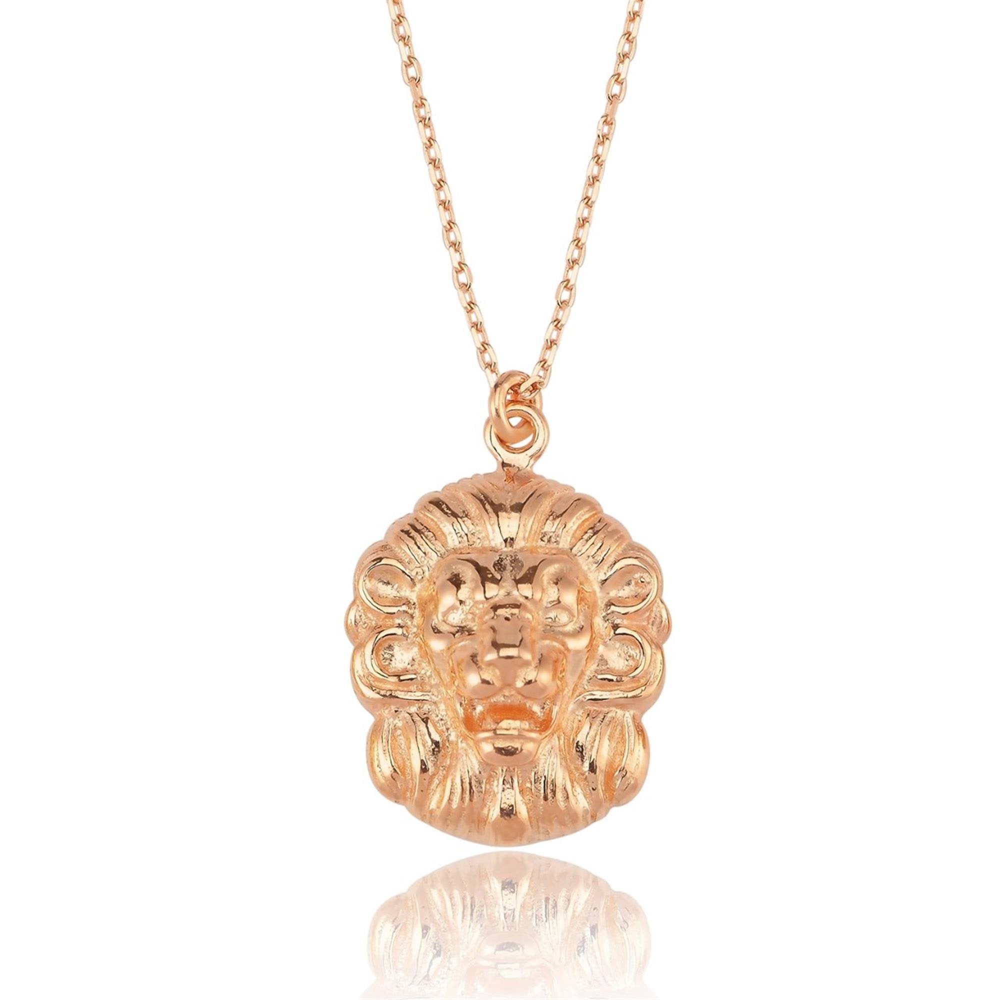 Colgante de cabeza de león en oro rosa símbolo de fuerza y coraje con un diseño llamativo y majestuoso.