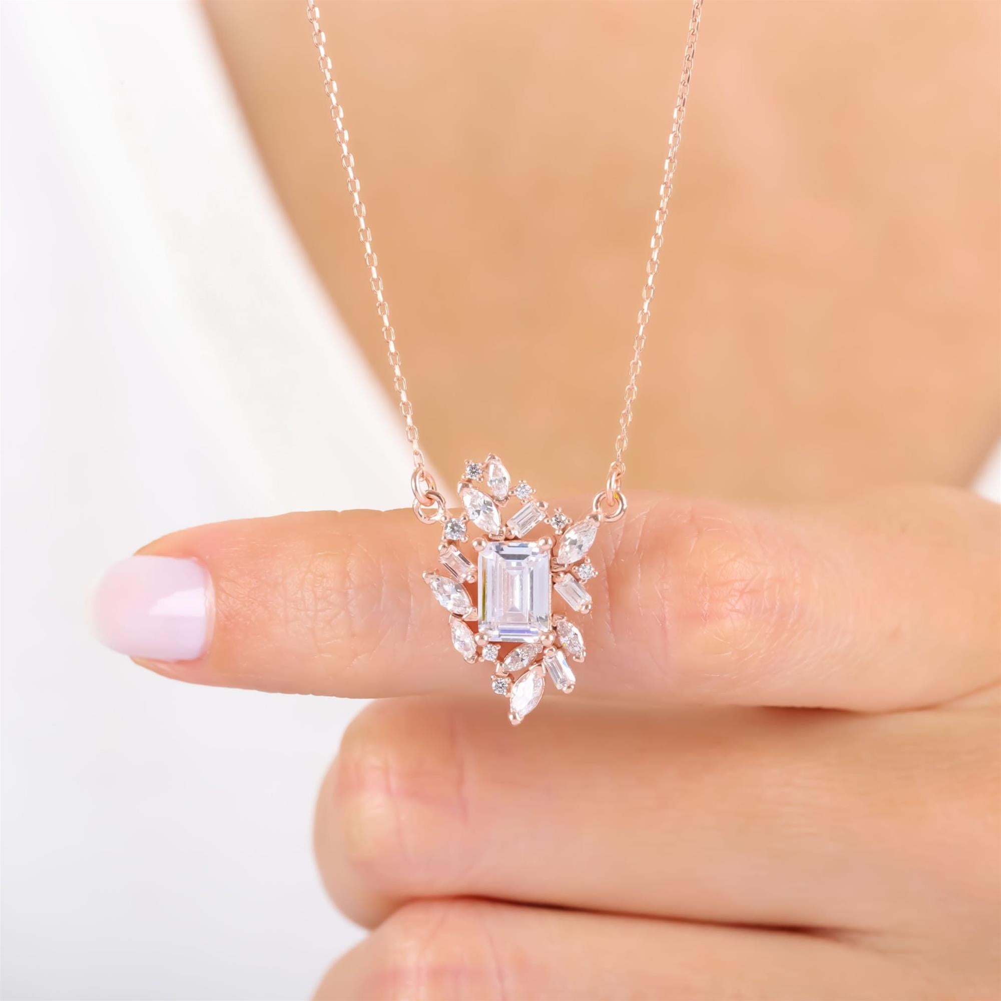 Rose gold plated sterling silver necklace with baguette-cut CZ center and marquise halo – elegant modern pendant for women