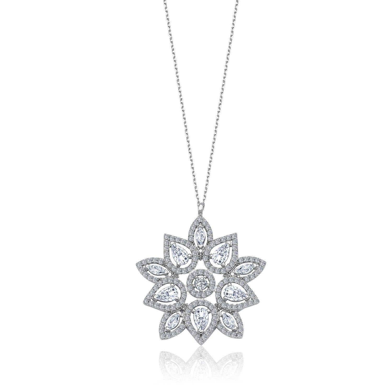 Sterling silver floral starburst pendant necklace with teardrop and round CZ stones – elegant and luxurious jewelry design